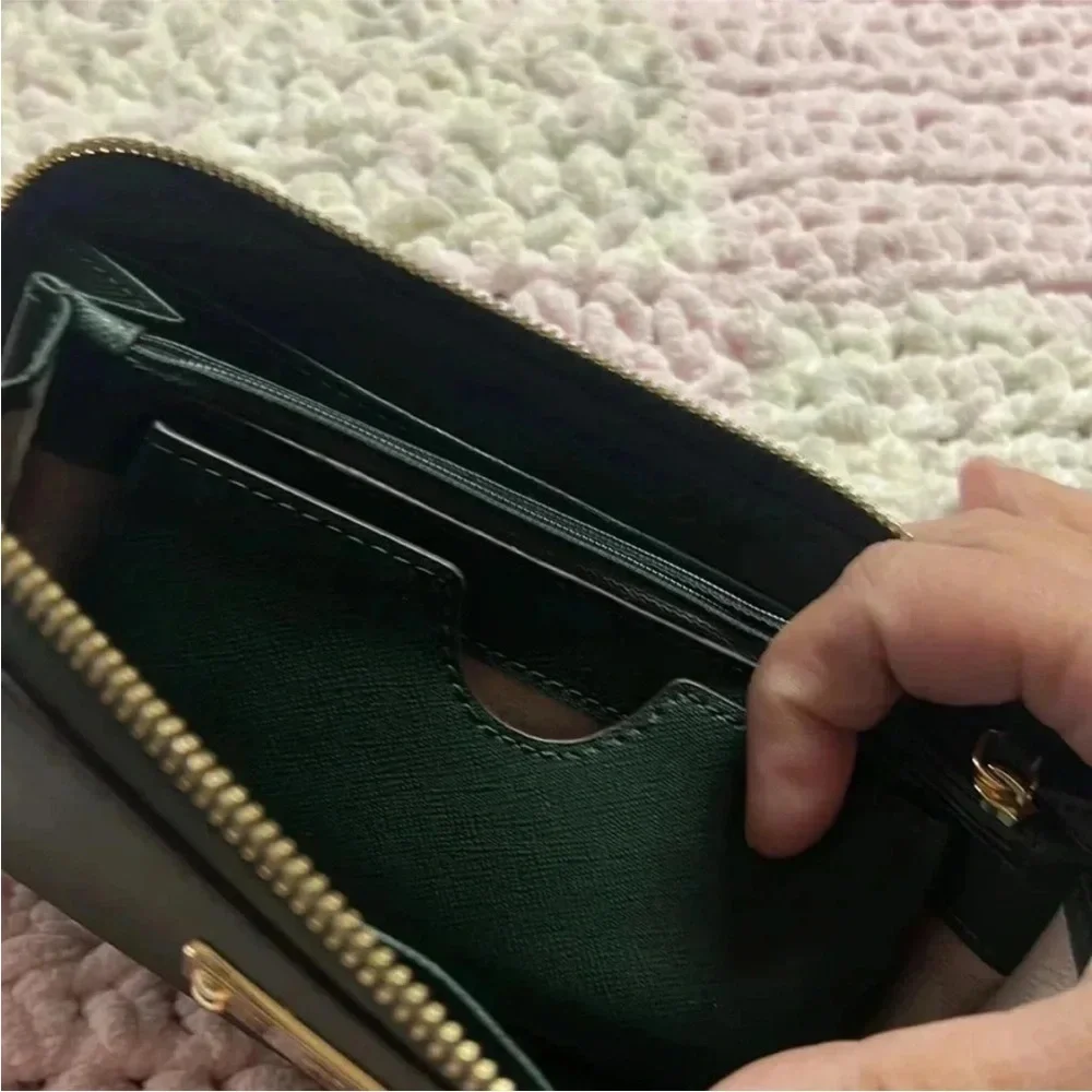 - Michael Kors green large wallet